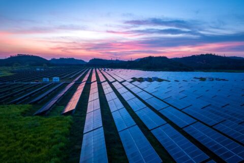 Aerial photography green outdoor solar photovoltaic power station in New England & Beyond